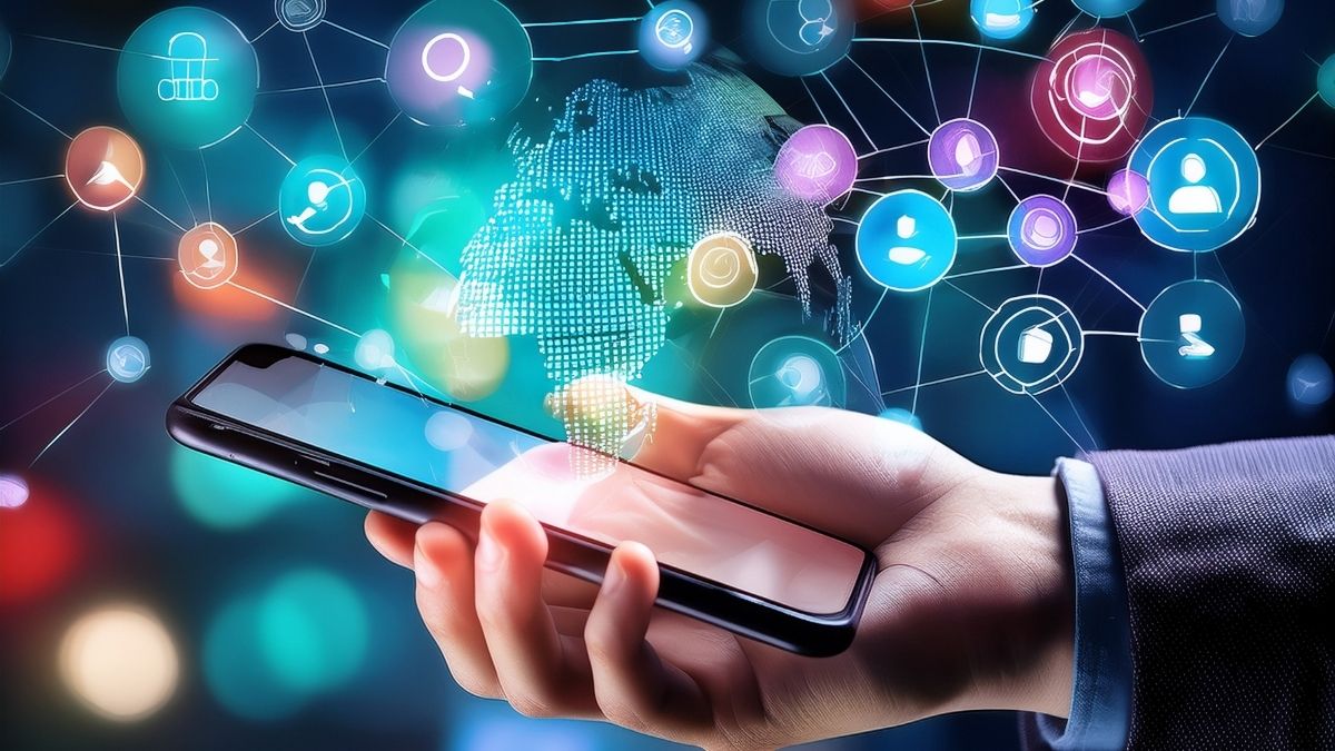 Hand holding a smartphone with social media icons and a digital globe floating above it — representing social media strategy for small businesses
